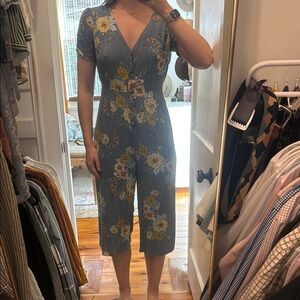 Blue Jumpsuit with Floral Print and Plunging V-neckline